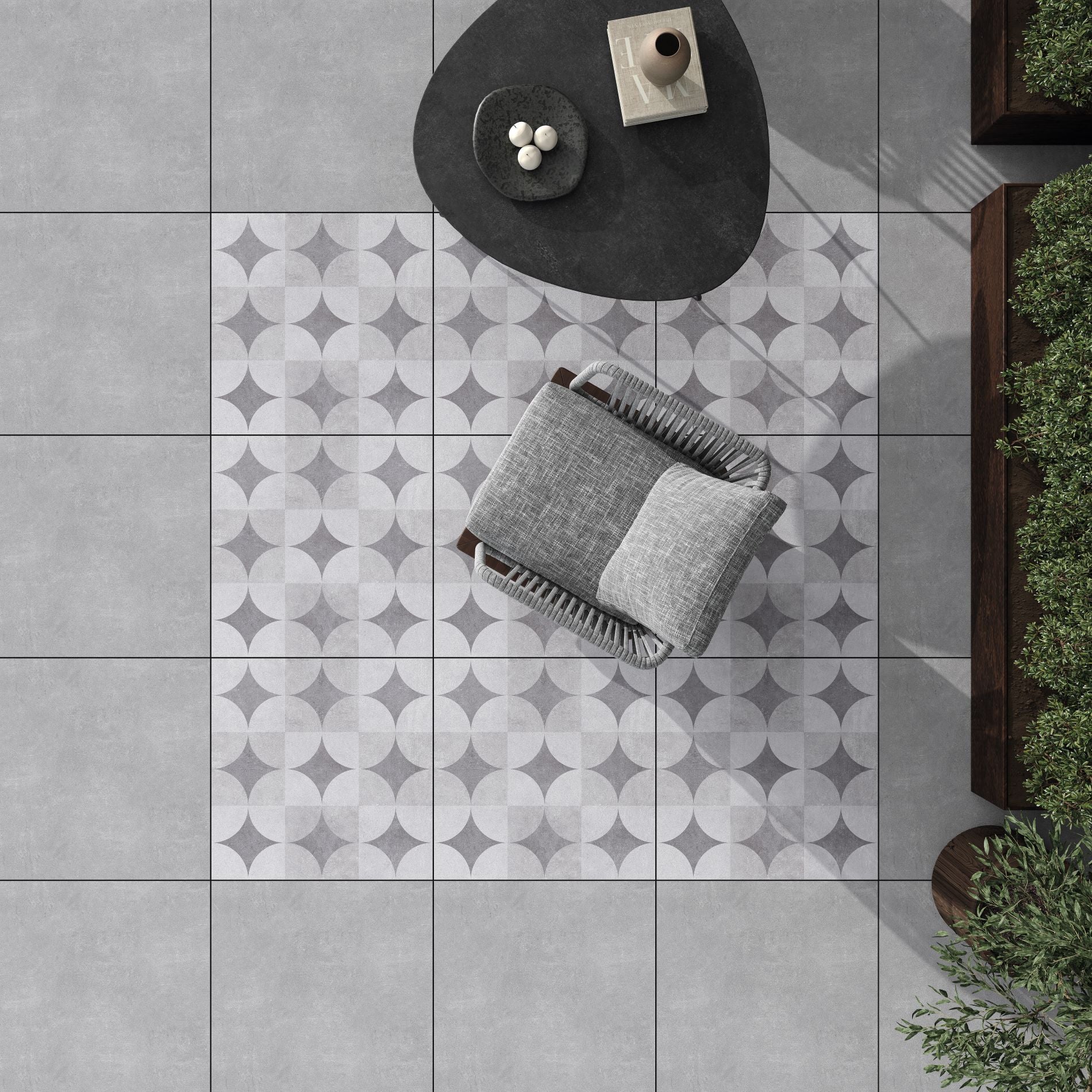 Bodrum silver light grey circle and diamond patterned tiles on a patio