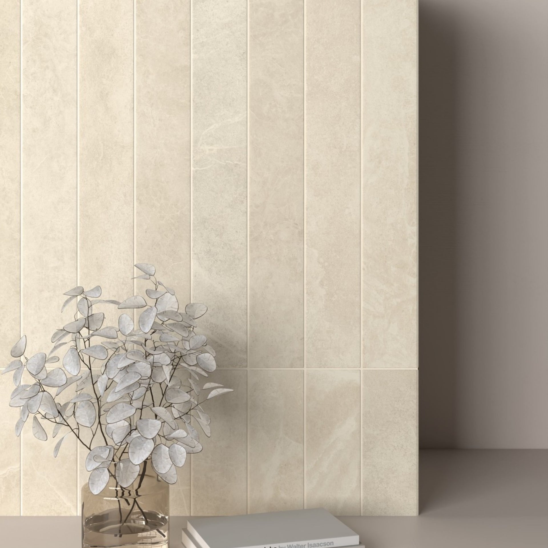 Beige metro tiles with a vase of white flowers and a book on a grey surface of a kitchen or living room setting

layout-kitchen