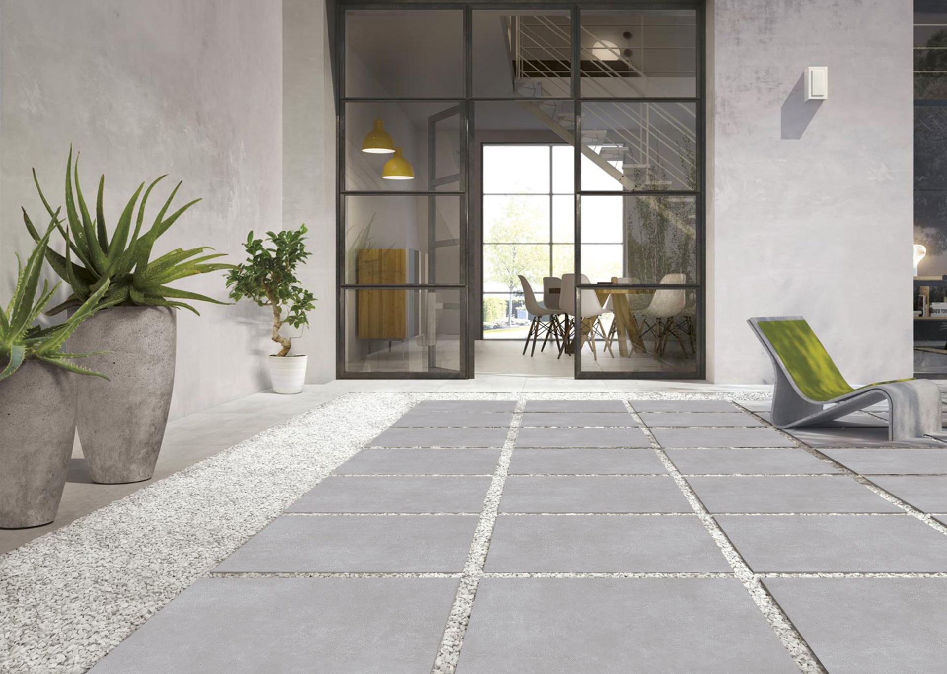 modern patio with bodrum silver stone-effect outdoor tiles laid out as stone path