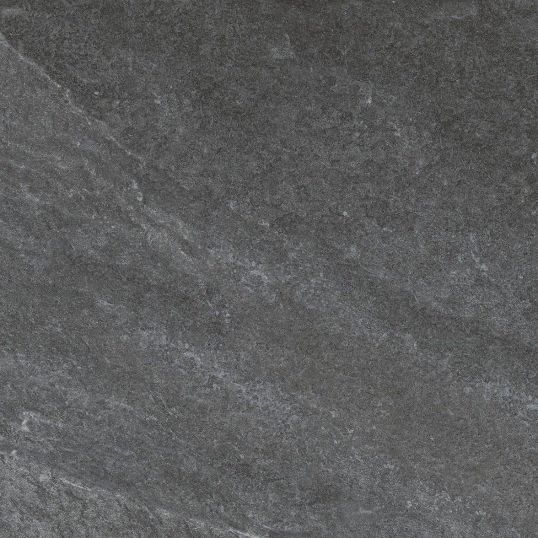 Close-up of a dark gray stone tile with subtle variations in texture.