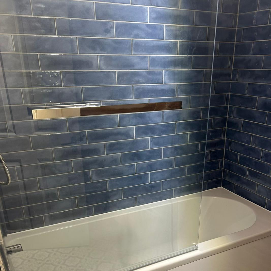 Blue tiles on bathroom wall - bathroom