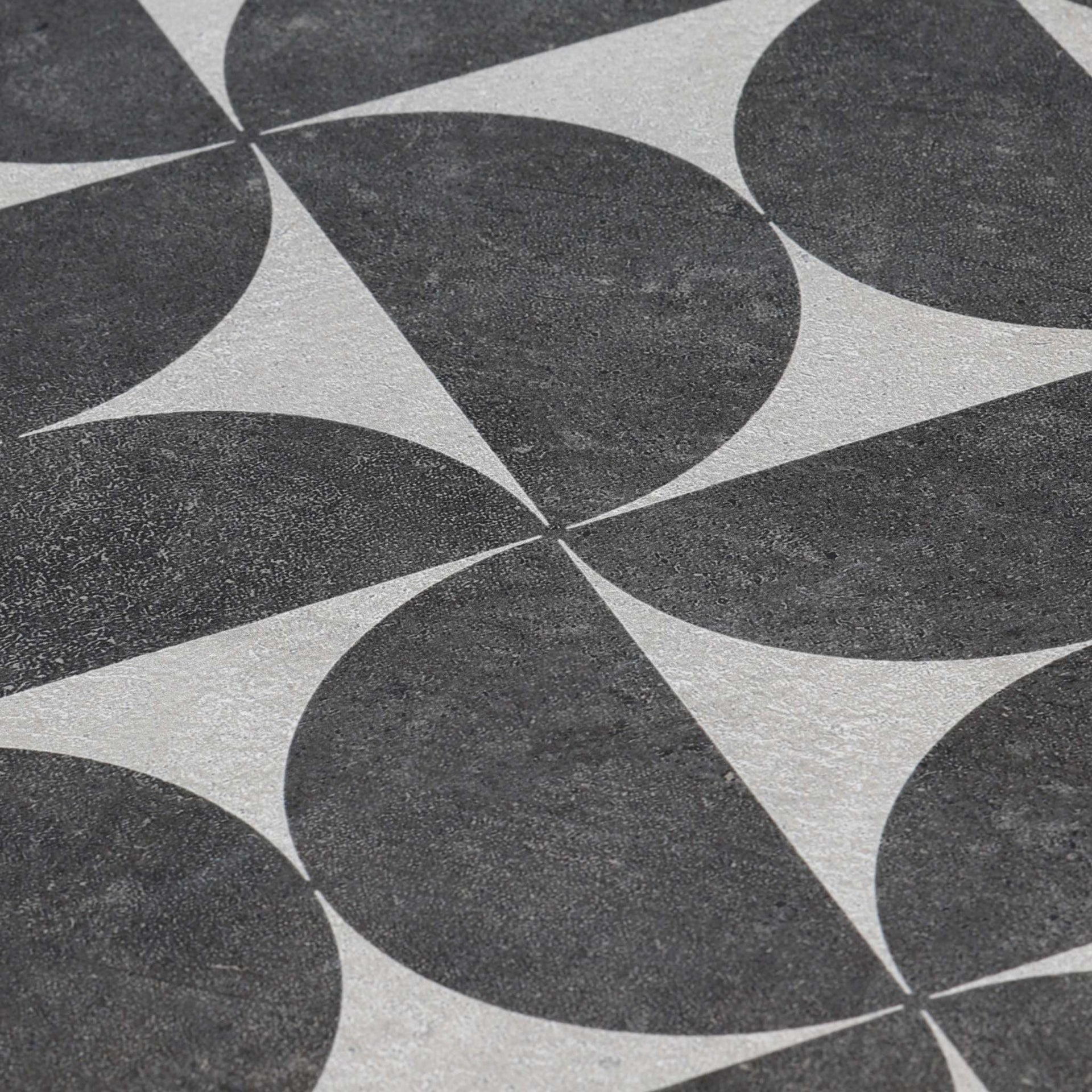 texture shot of Bodrum Eclips geometric tile pattern with dark grey and light grey colours