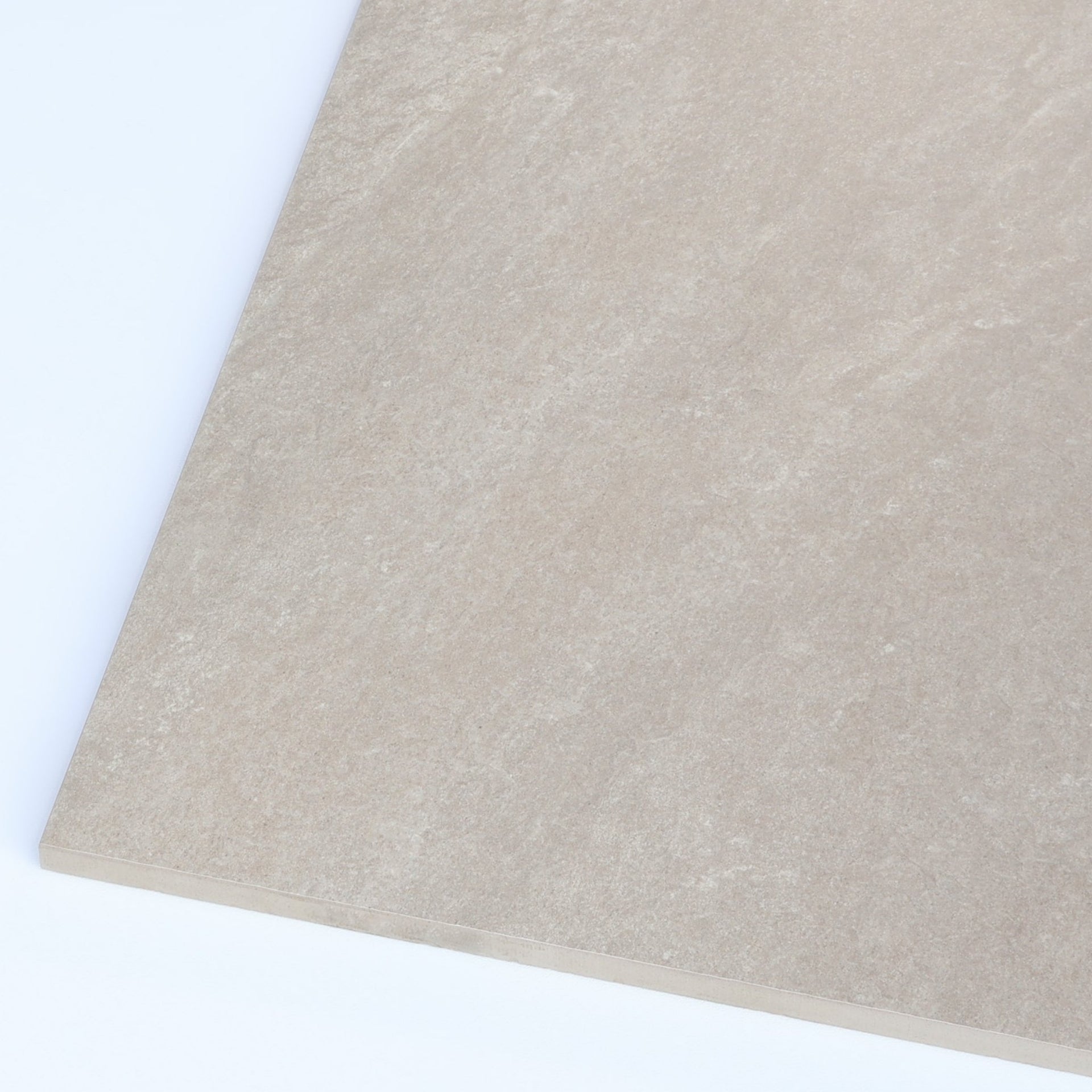 close-up angled shot of Headley beige stone-effect outdoor tiles