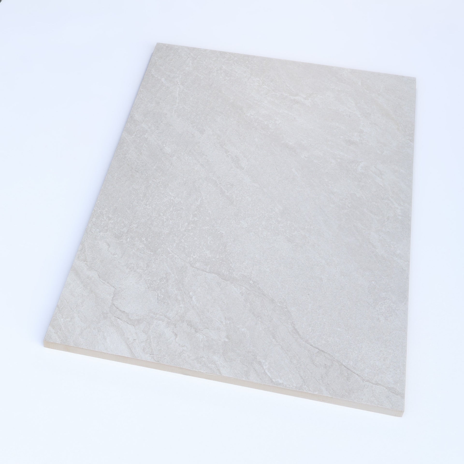 angled shot of Headley white stone effect outdoor tiles