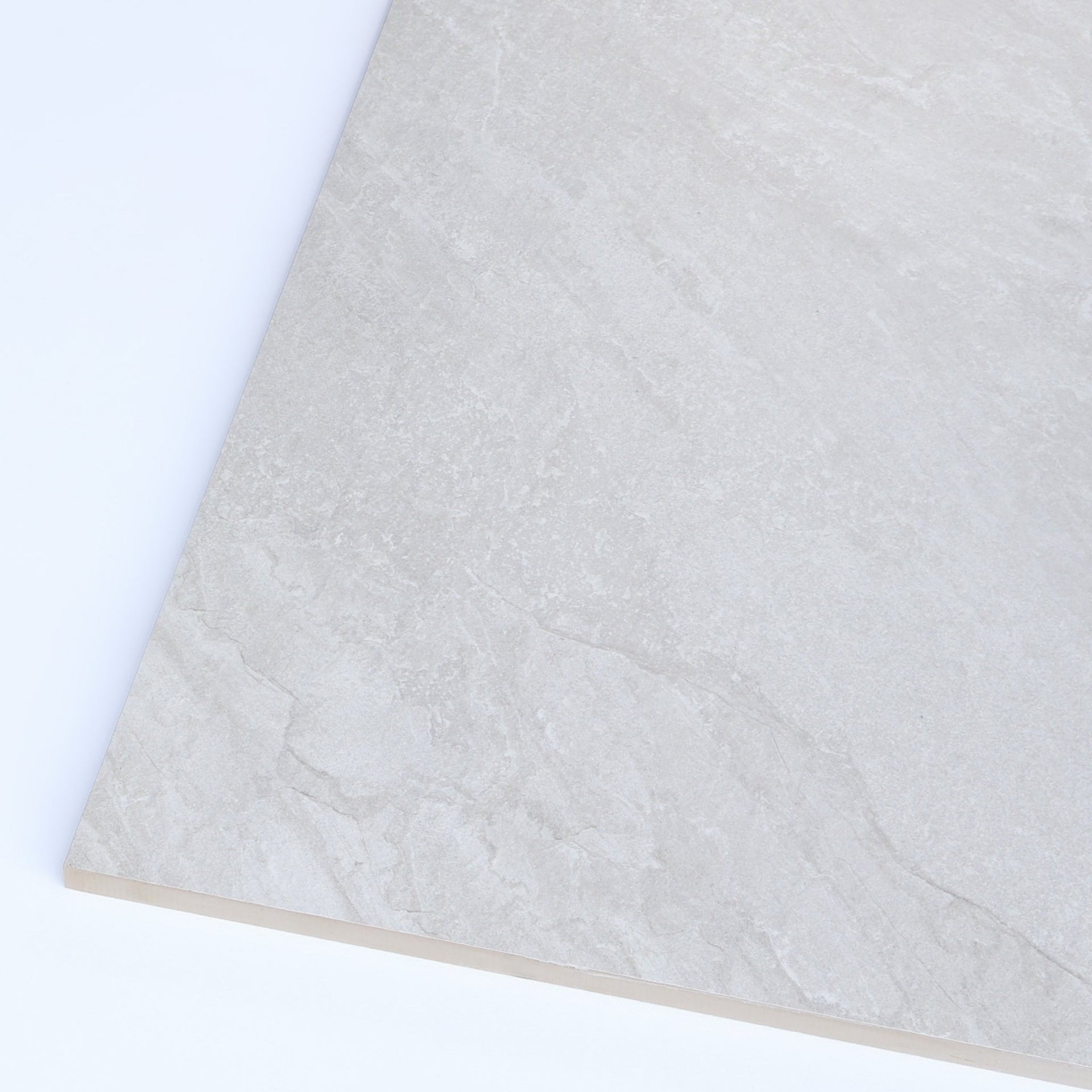 close up of Headley white stone effect outdoor tiles