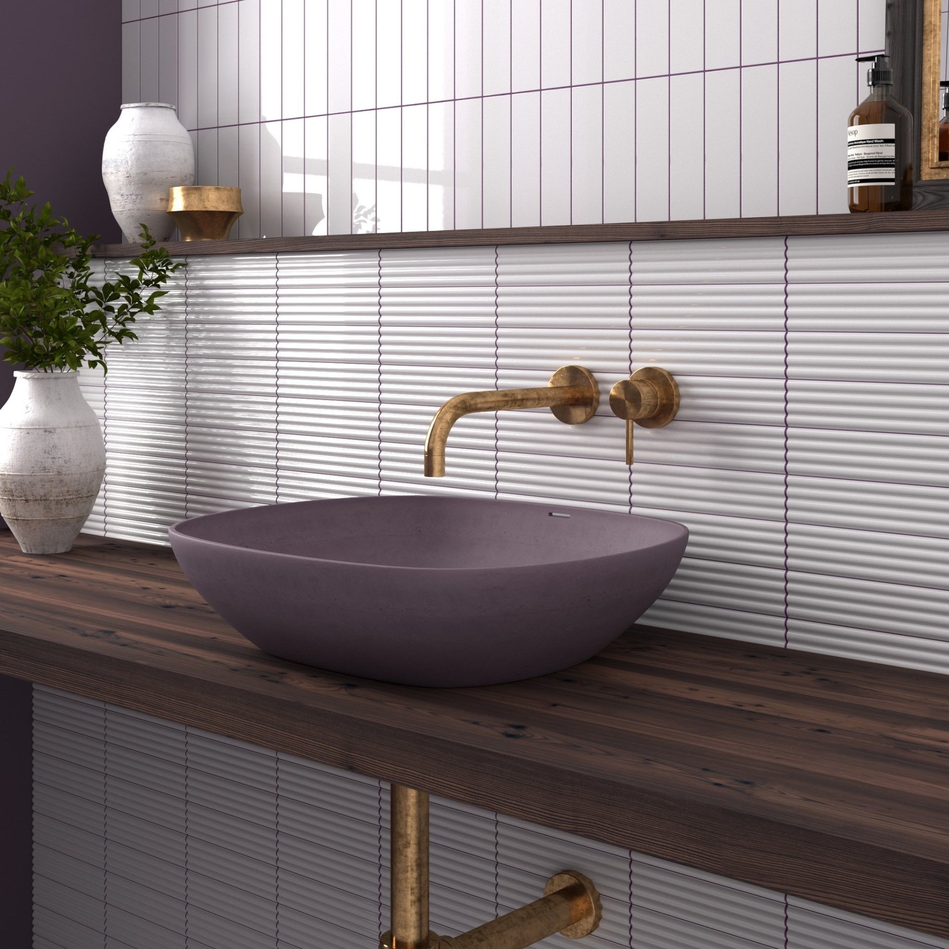 Bathroom vanity with a purple sink and gold faucet against a Moledo tiled fluted white wall. 

layout-bathroom