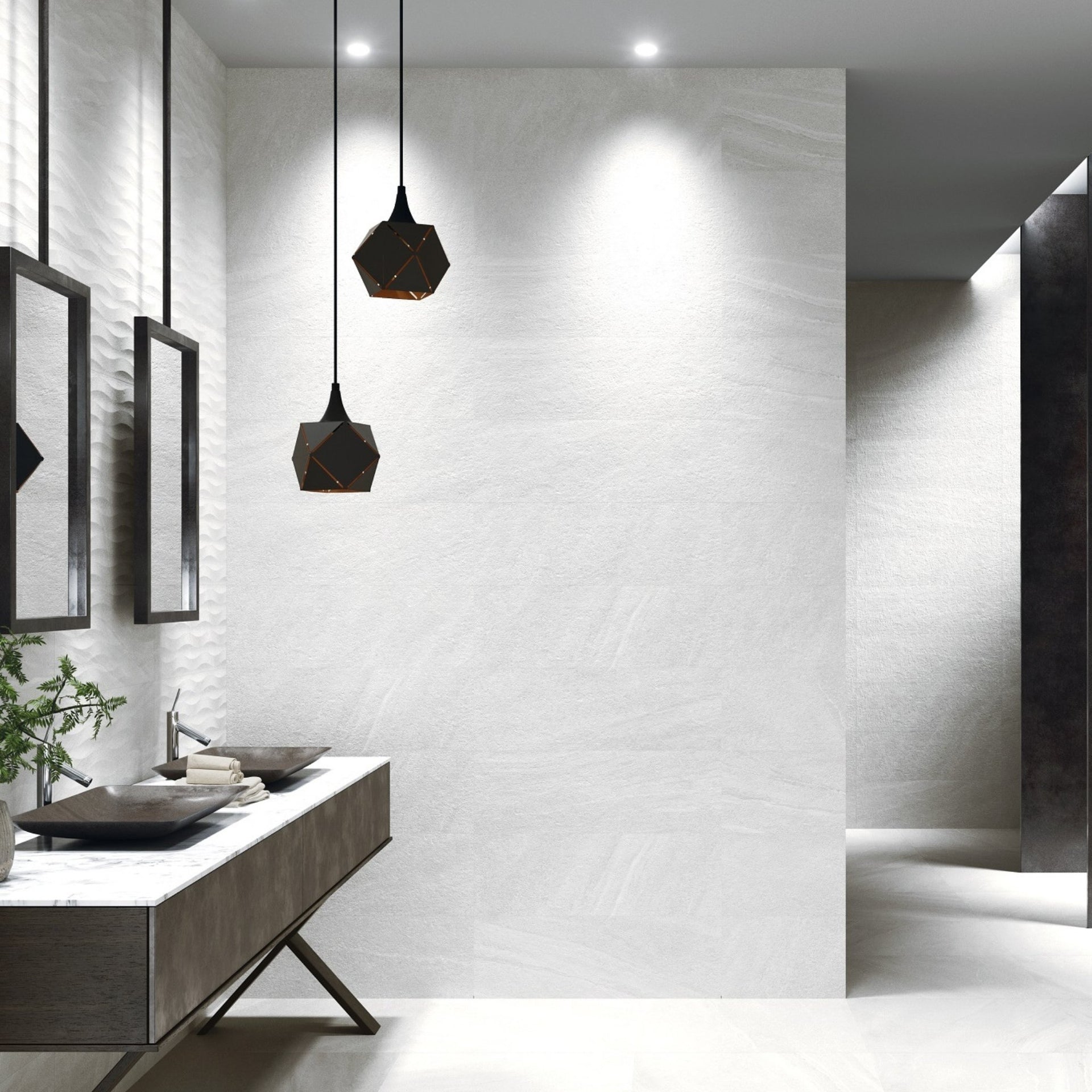 bathroom vanity with sink and mirrors on New York tiled white stone effect wall and floors.