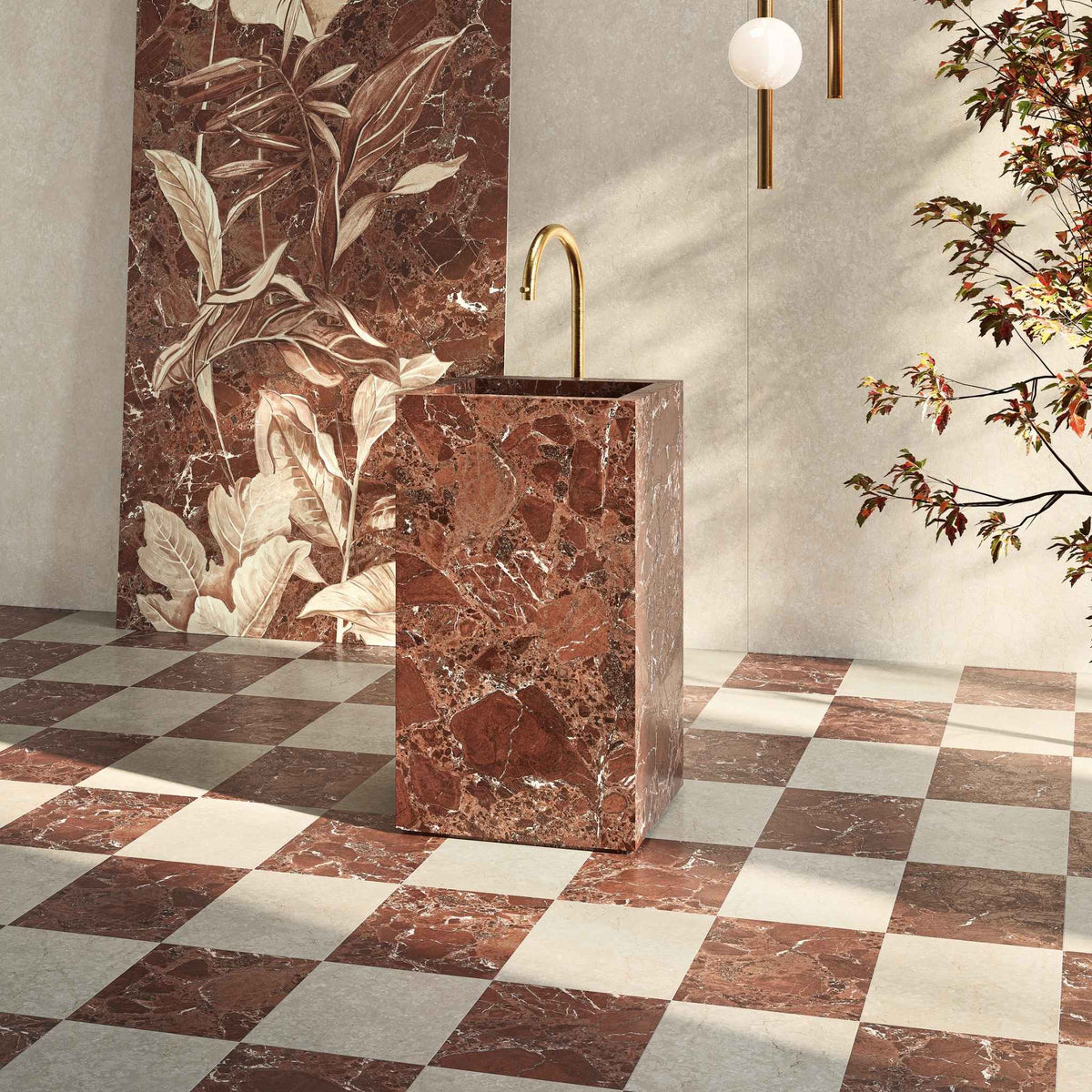 A modern bathroom scene featuring a rectangular pedestal sink made of Sillara reddish-brown marble effect, set against a wall with matching checkered tiled floor of Sillara red and ivory marble effect.

layout-bathroom