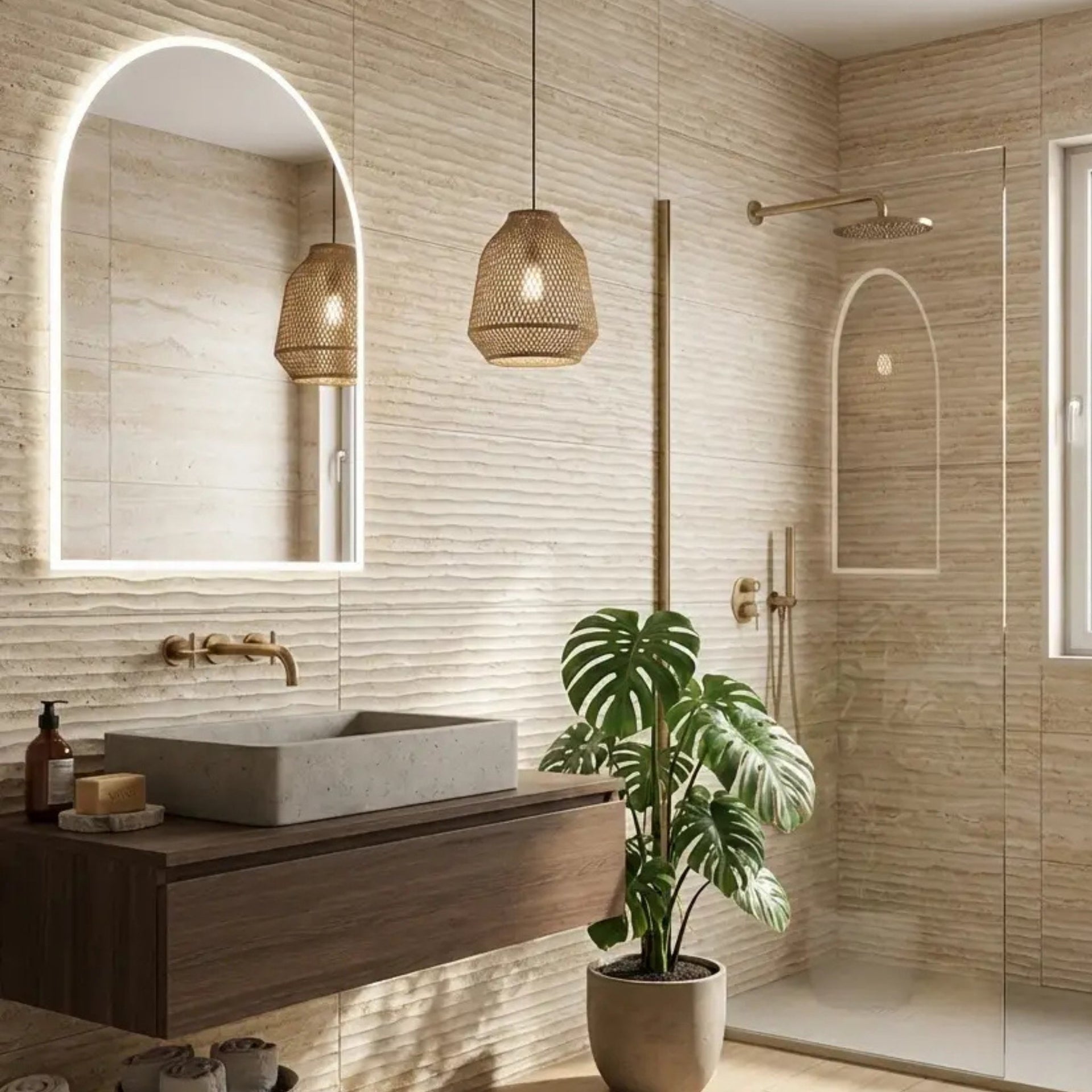 Modern bathroom shower on sunstone wave decor beige wall tiles, with wooden vanity, sink, and plant