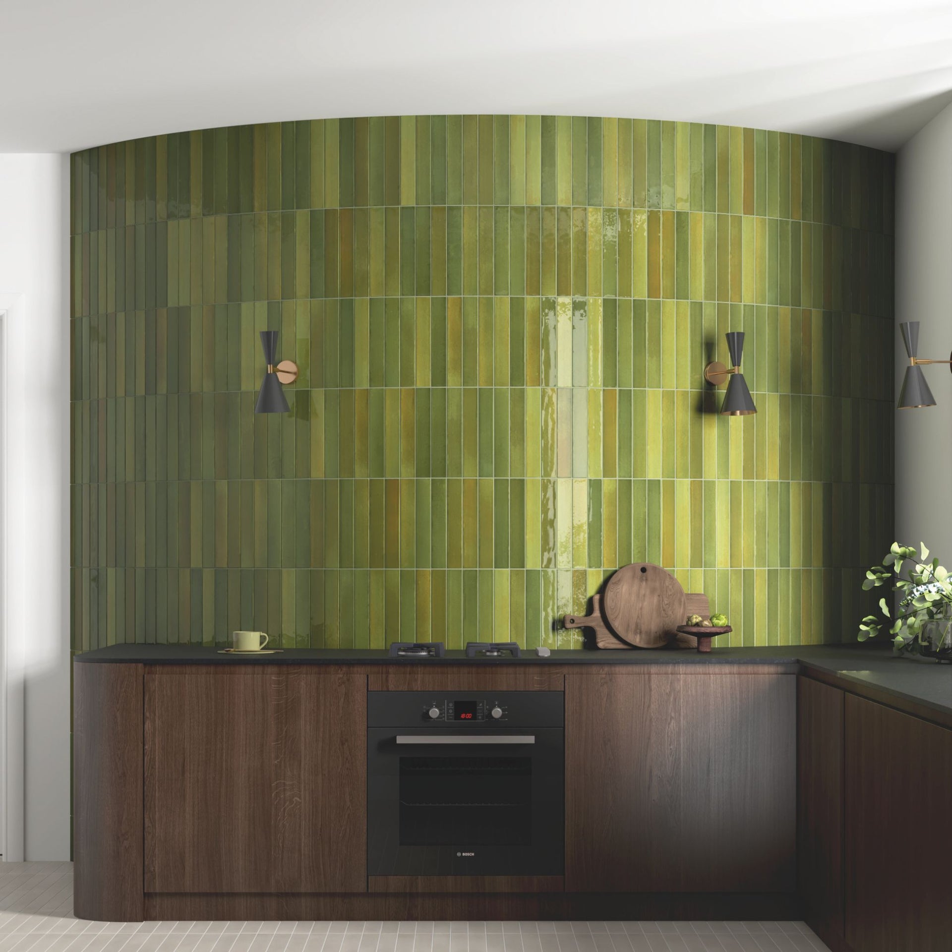 Modern kitchen with green glossy tonal tiled wall and wooden cabinets