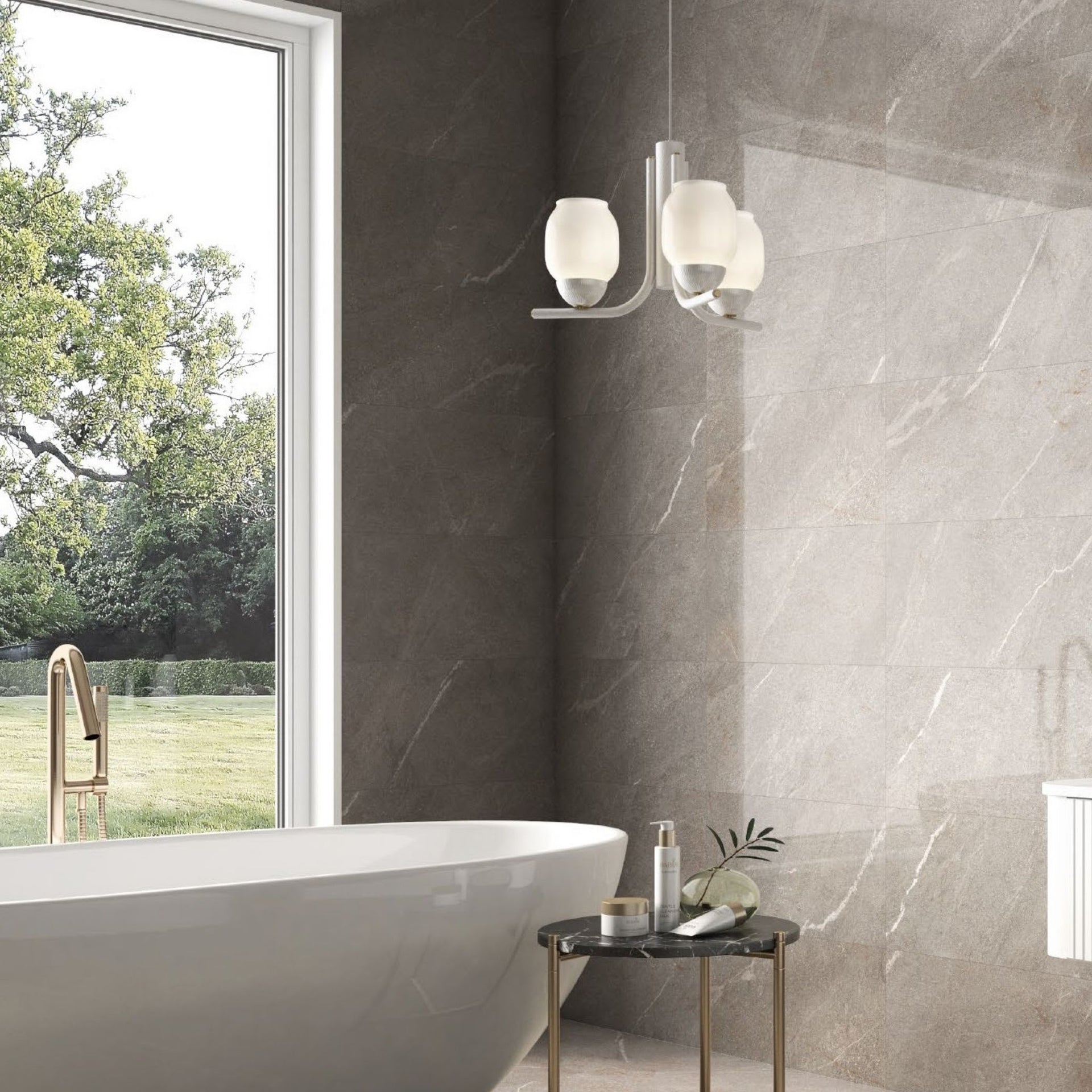 Modern bathroom with a freestanding bathtub, tourmalet taupe stone effect walls, and a window view of greenery.